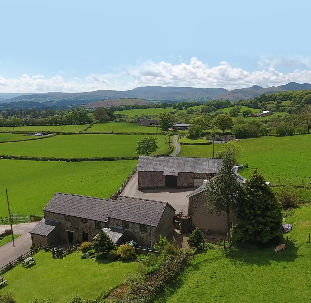 Aerial view of cottages at Cefncoedbach Farm